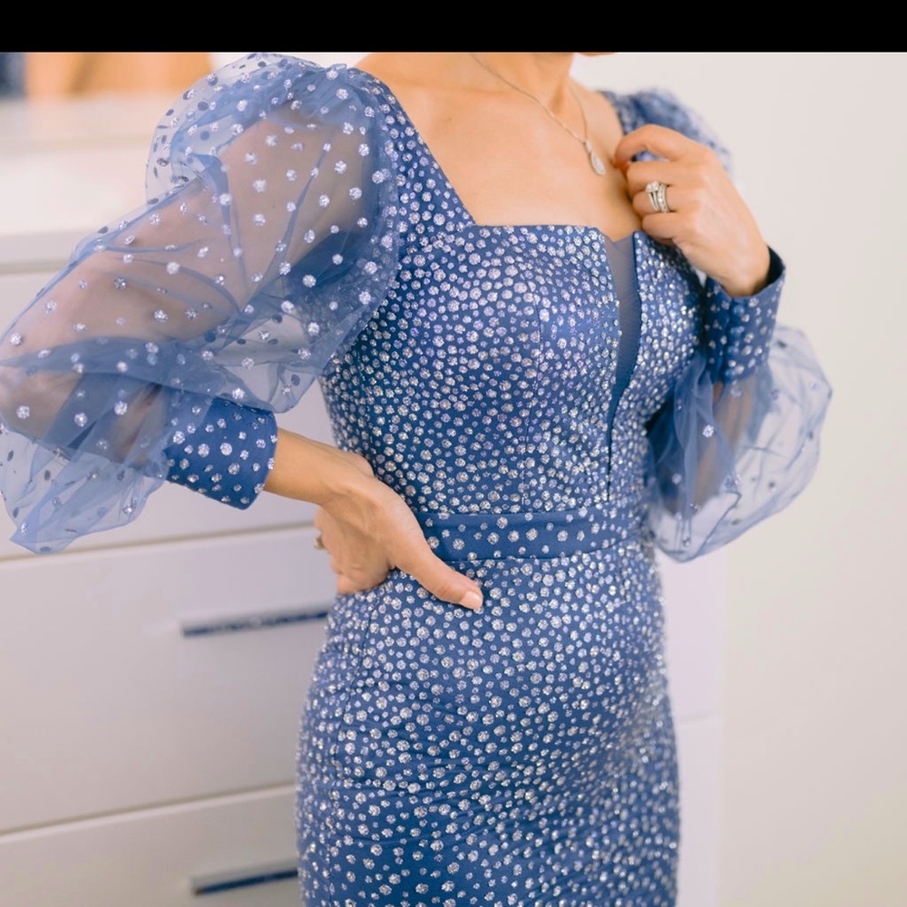 Blue ‘Pierre Cardin’ long gown with silver dots.